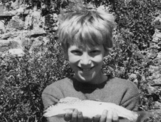 Matt-at-10yrs-old-with-small-brown-trout-673x511